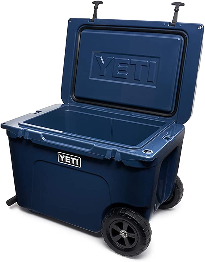 Tundra Haul Portable Wheeled Cooler takes the Tundra's legendary toughness and unmatched insulation power to the next level. It features a solid, impact- and puncture-resistant single-piece tire construction. The cooler has a durable welded aluminum arm with comfortable grips, designed for heel-friendly towing that tracks left or right. With rotomolded construction, it is virtually indestructible. The Permafrost Insulation includes pressure-injected commercial-grade polyurethane foam in the walls and lid, ensuring your ice stays ice.