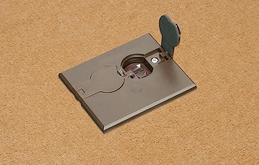 This 1-Gang Brown Adjustable Floor Box Kit includes an outlet and flip plate, ideal for installed floors. The cover gasket effectively prevents water intrusion, while the container protects the outlet when unused. Explicitly designed for installed flooring, we also provide floor boxes suitable for new concrete and various job sites. The oversized covers discreetly conceal miscut carpet, ensuring a tidy appearance. It offers a convenient solution for installing a receptacle (outlet) in the floor. The oversized covers' non-metallic construction further helps hide any miscut carpet on the floor.